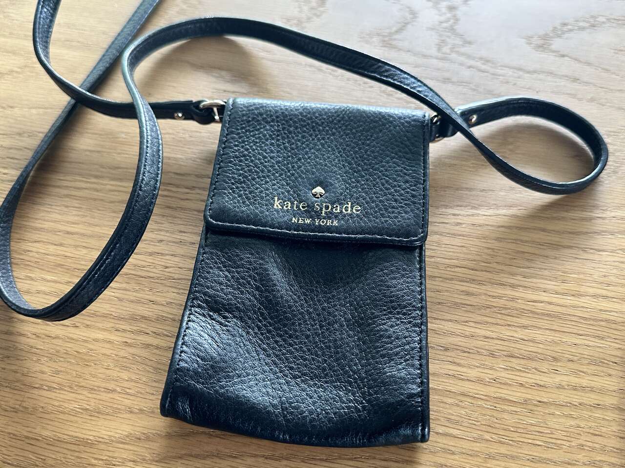 Kate Spade crossbody bag. Good for phones.