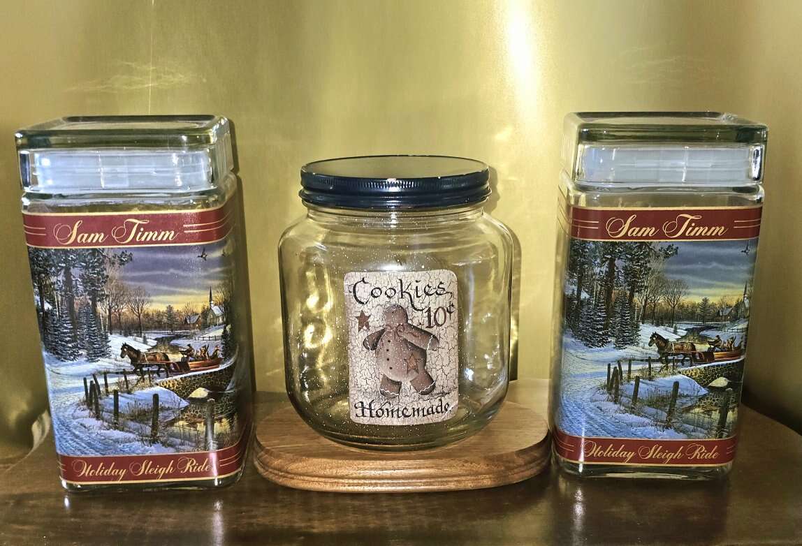 Two Glass 'Sam Timm' Sleigh Ride and Cookies Jar