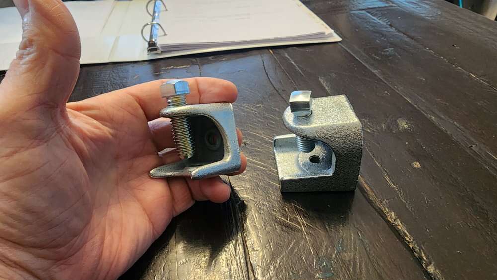 Strut to beam clamps.