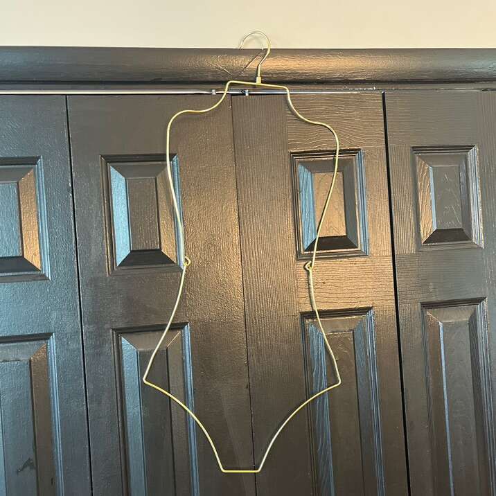 Body Shape Gold Hangers. Brand New