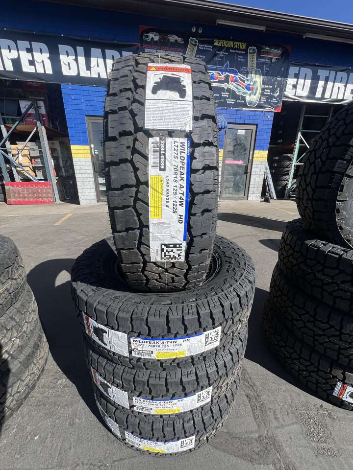 FULL SET OF LT275/70R18 FALKEN WILD PEAK A/T4 10PLY LOAD RANGE E WITH 55K MILES WARRANTY. AWESOME DEAL