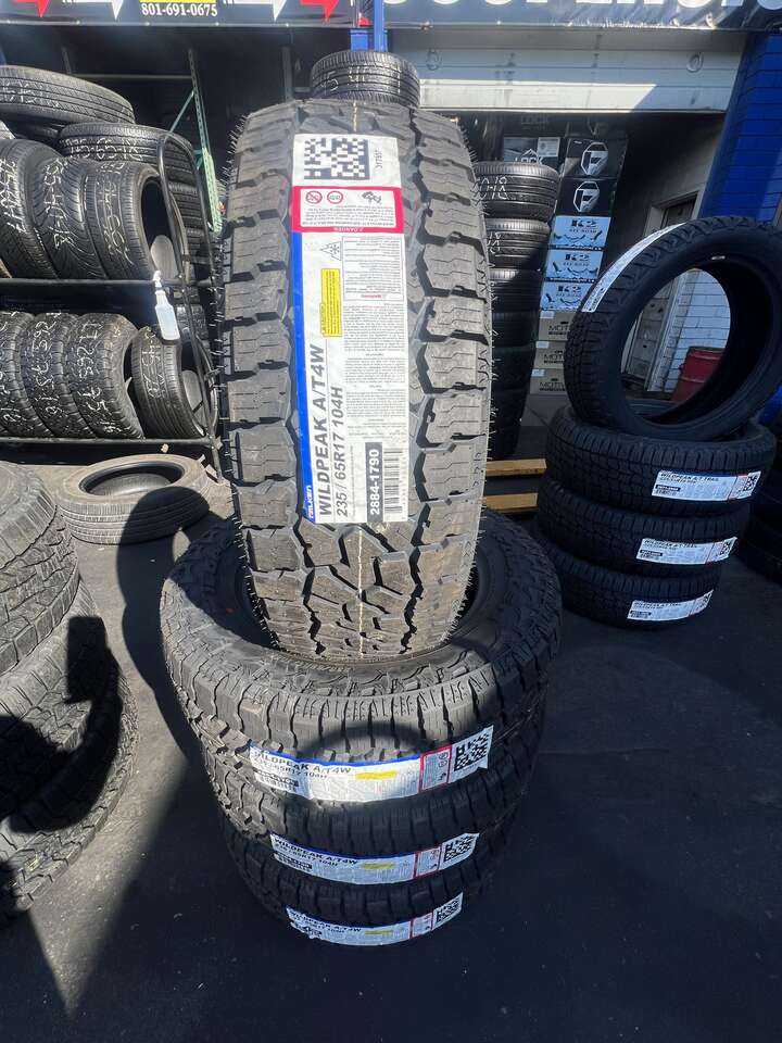 SET OF 235/65R17 FALKEN WILD PEAK A/T4 WITH 55.000 MILES WARRANTY AWESOME DEAL