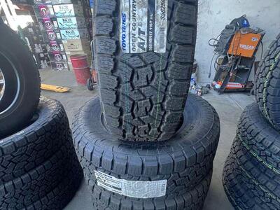 SET OF P265/65R17 TOYO OPEN COUNTRY A/T WITH 55.000 MILES WARRANTY AWESOME DEAL