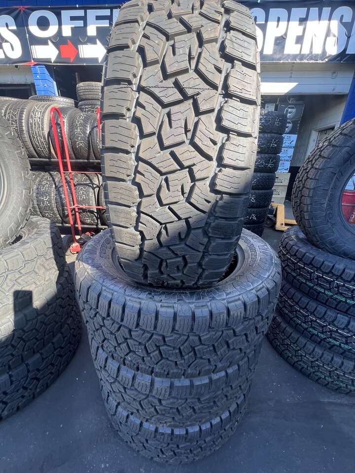 SET OF P285/55R20 TOYO OPEN COUNTRY A/T ,WITH 55.000 MILES WARRANTY AWESOME DEAL