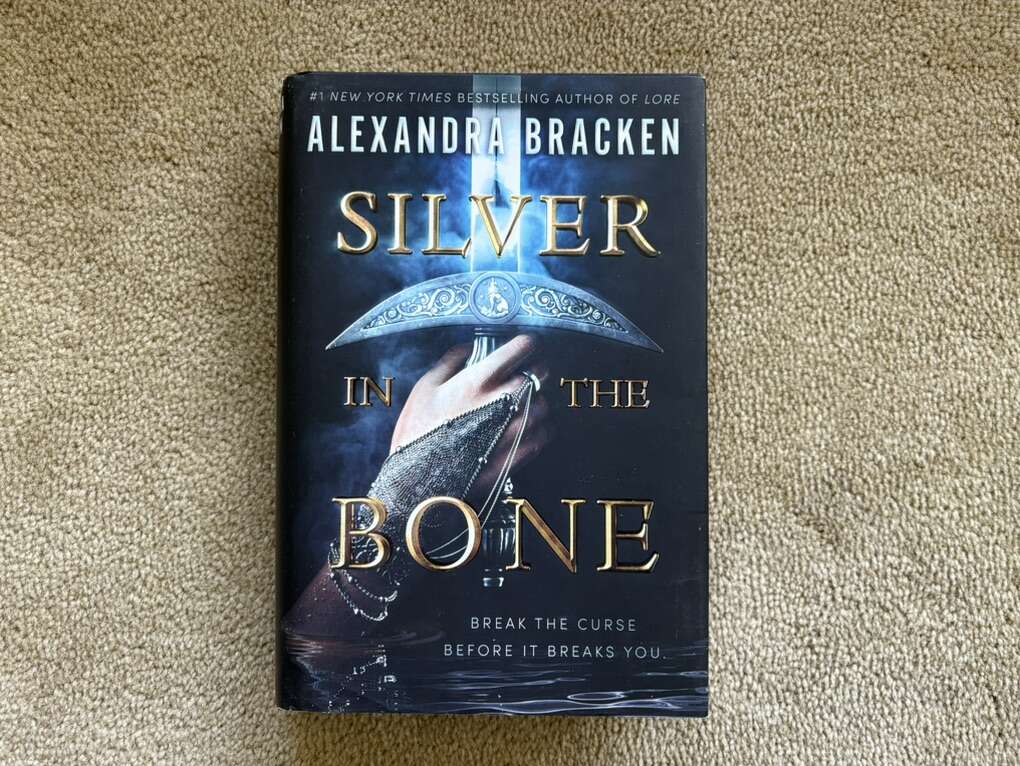 Silver in the Bone, by Alexandra Bracken (hardcover)