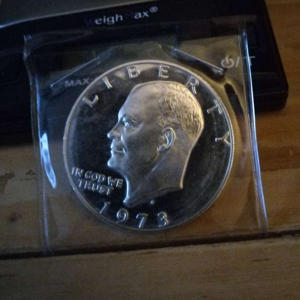 key date, 73 silver Ike  Brown box included