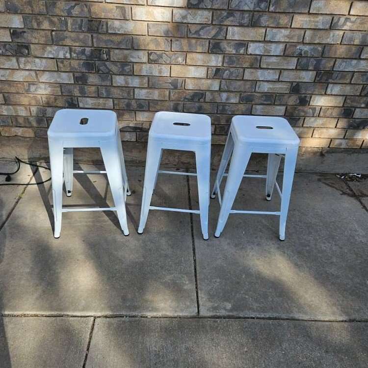 3 stackable metal chairs