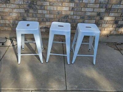 3 stackable metal chairs