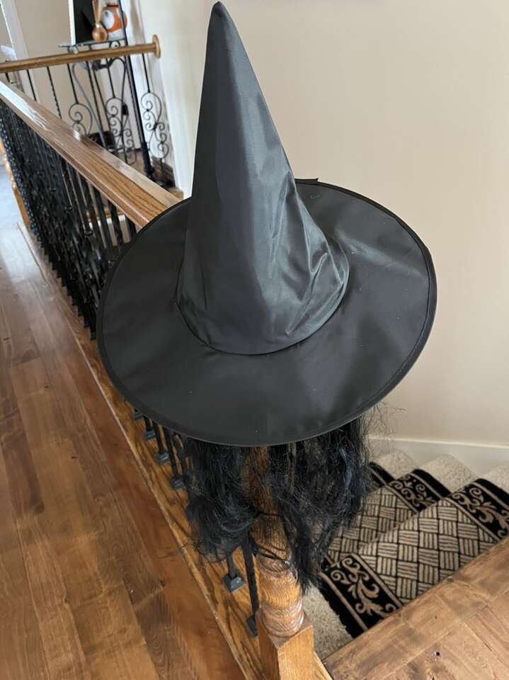 Child’s black one sized witch hat with hair