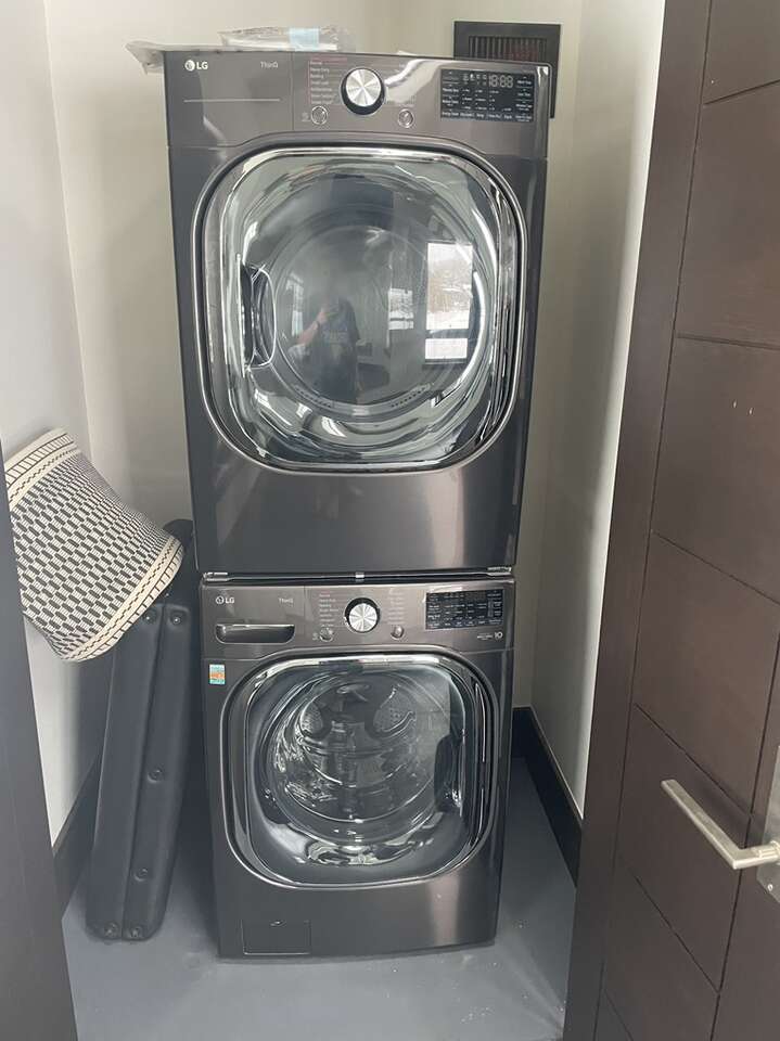 Stacked LG Washer And Gas Dryer Appliances