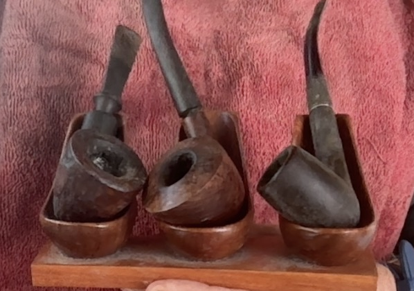Wooden Tobacco Pipe Stand, with 3 old tobacco pipes.