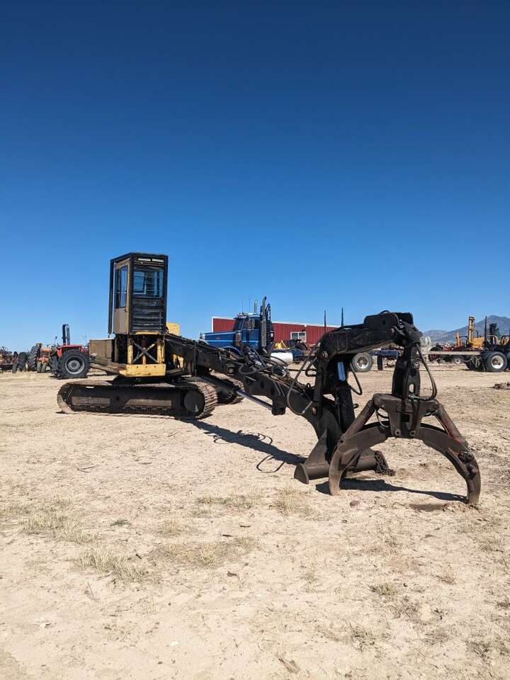 John Deere 690b excavator conversion log loader cummins