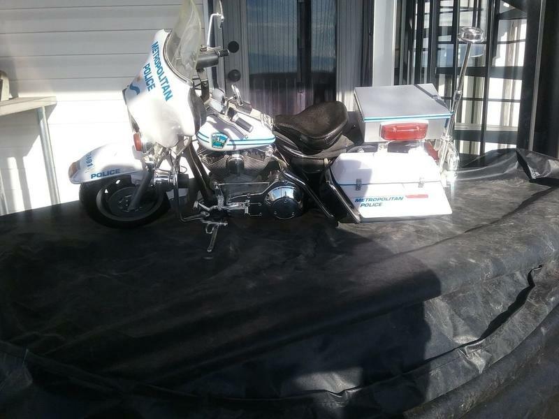 Toy motorcycle & dolls