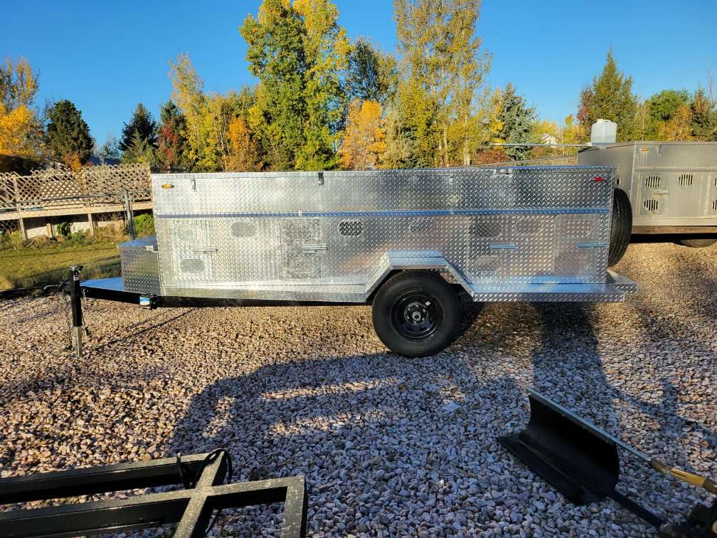 Aluminum dog boxes, toppers and trailers