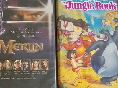 2 Disney VHS Tapes. Merlin and Jungle Book