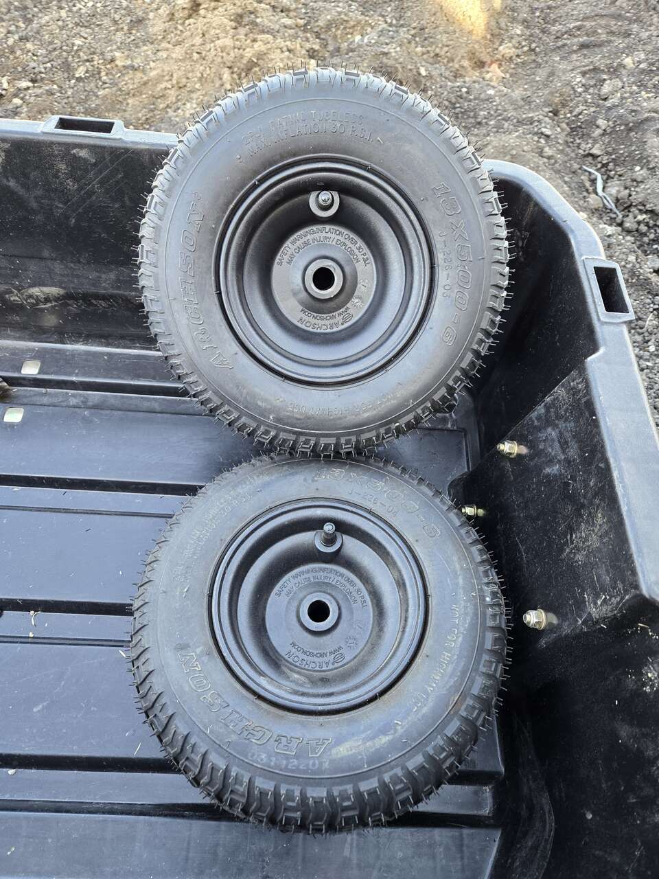 2 Archson 13x5-6 Tires on Black Plastic Wheels