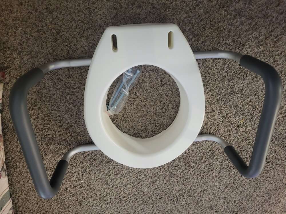 New toilet riser with arms