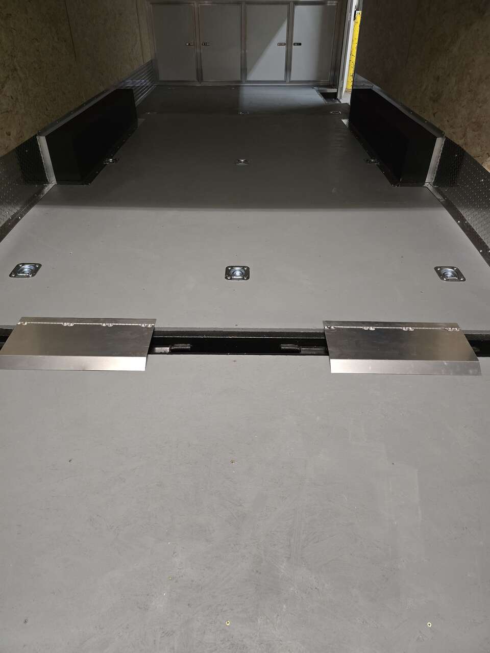 Enclosed trailer ramp transitions