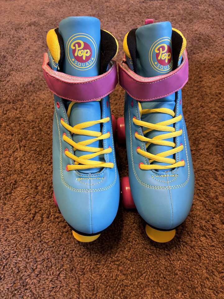 NEW--ROLLER SKATES