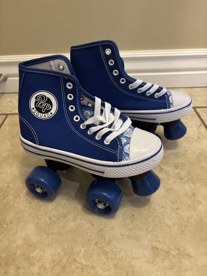 NEW--ROLLER SKATES