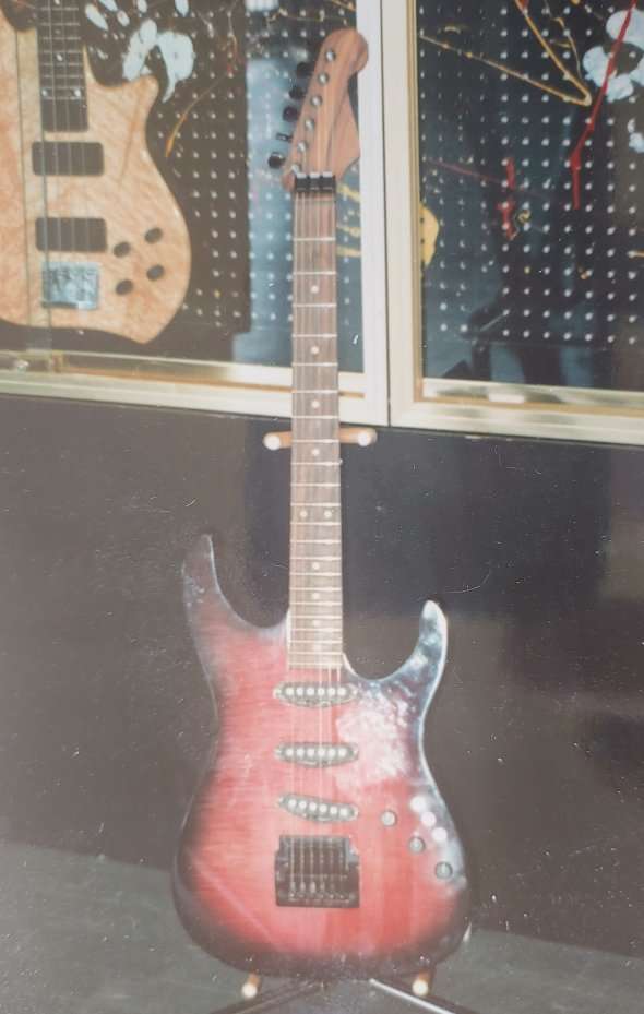 Looking to BUY my old Guitar