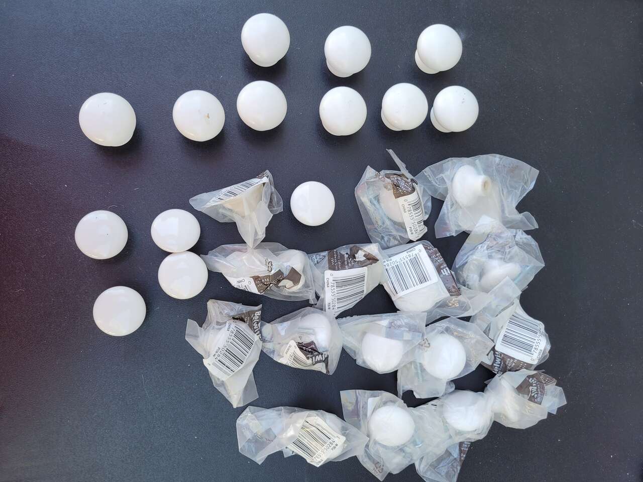 White Cabinet knobs all for $35