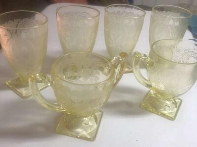 Depression glass yellow cream, sugar and tumblers lot.