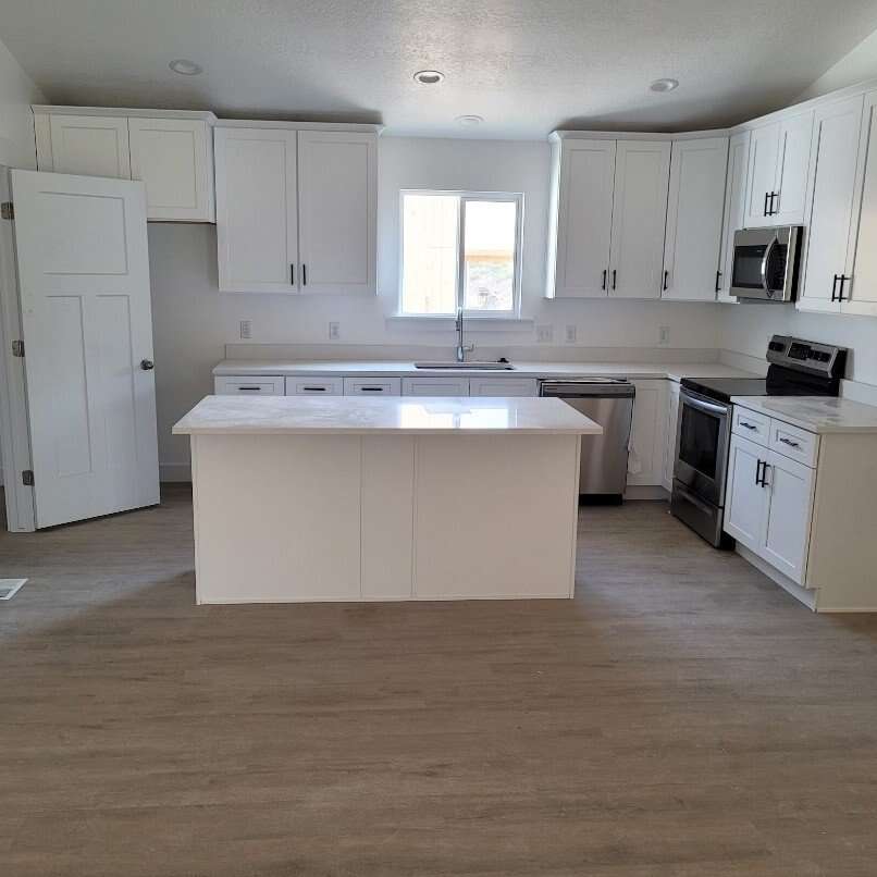 7x48 12mil waterproof lvp 100sqf availa $.99sqf