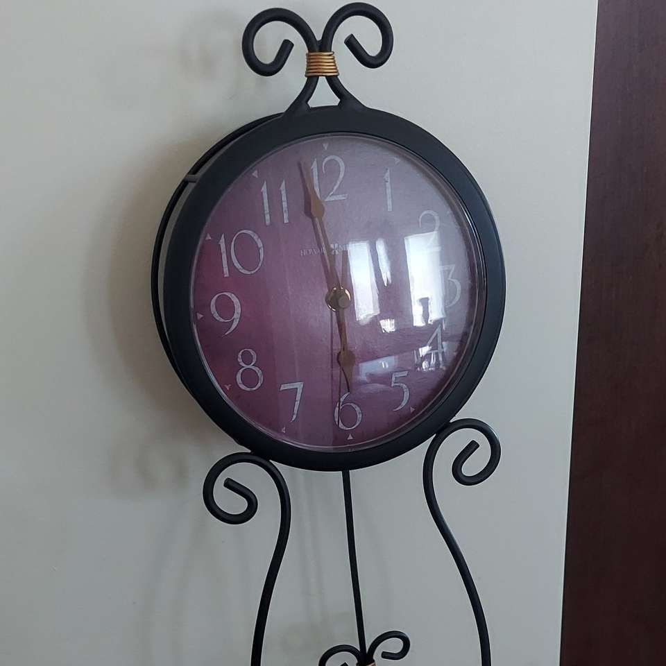 Wrought iron Howard Miller wall clock