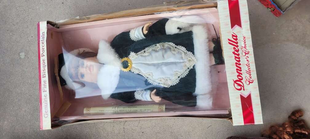 doll new in box with certificate and stand