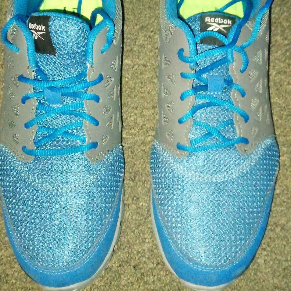 Steel-toed Reebok blue and gray tennis shoes