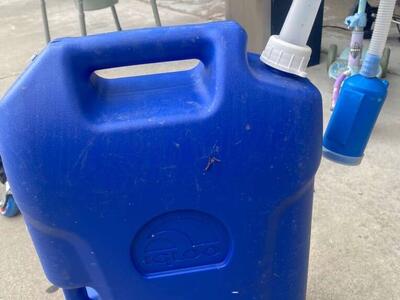 Igloo 6 Gallon Camping Jug With Spout And Hose.