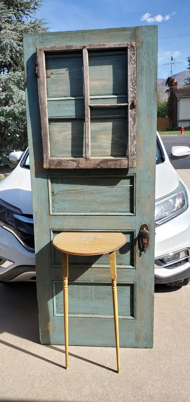 ANITQUE DOOR WITH VINTAGE WINDOW AND ATTACHED FOLDING TABLE