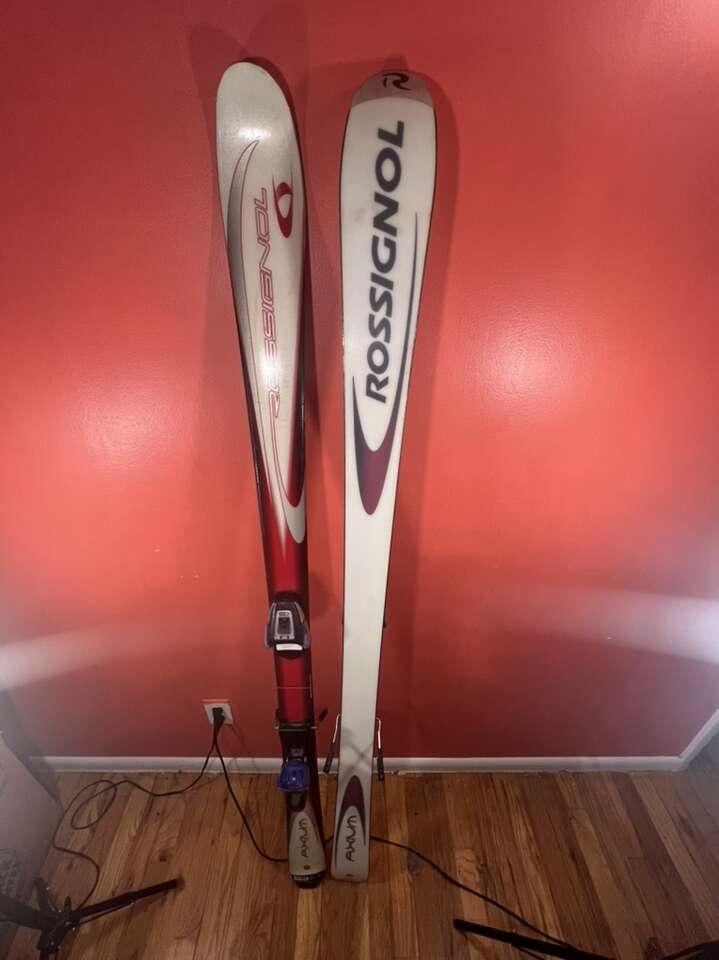 Woman And Male Pair Of Ski