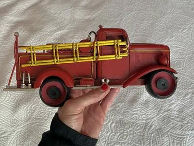 Metal fire truck wall hanging 11” long 5” tall