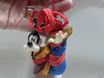Disney tied up in a bow goofy ornament 4”