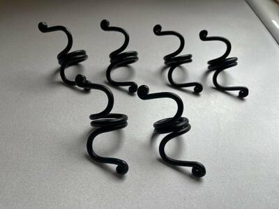 Set of 6 black metal napkin rings 4” long