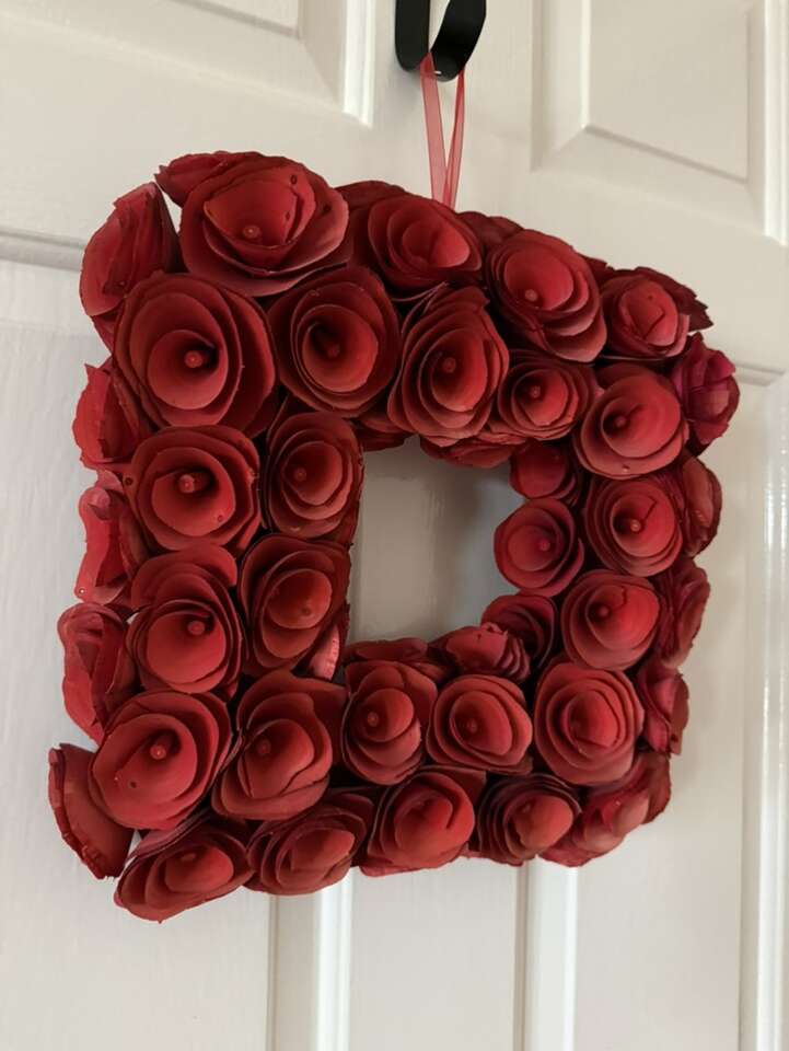 Red wooden rose wreath 14” light fading on edges