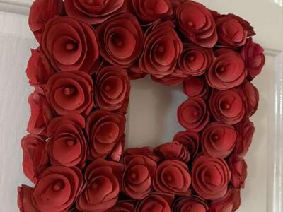 Red wooden rose wreath 14” light fading on edges