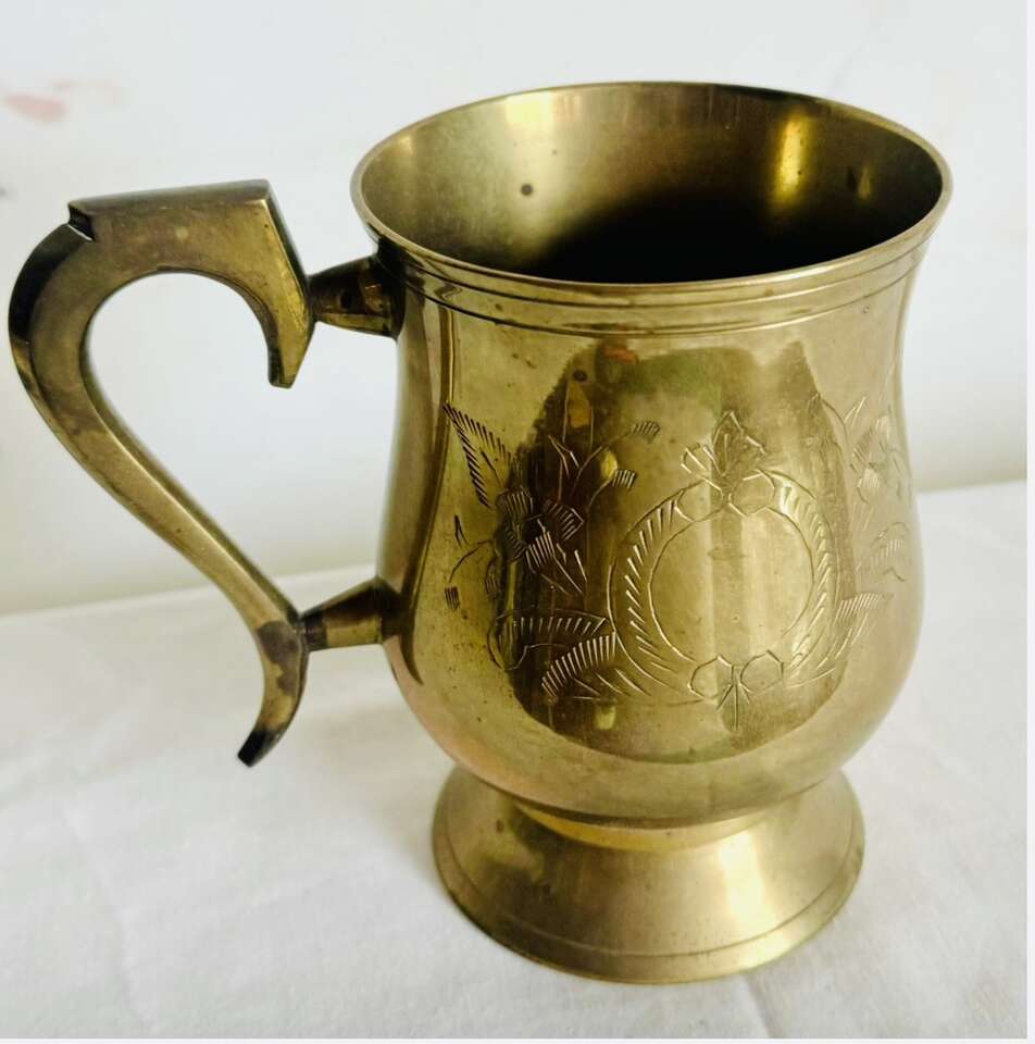 Antique full metal mug w/ chiseled decoration $12