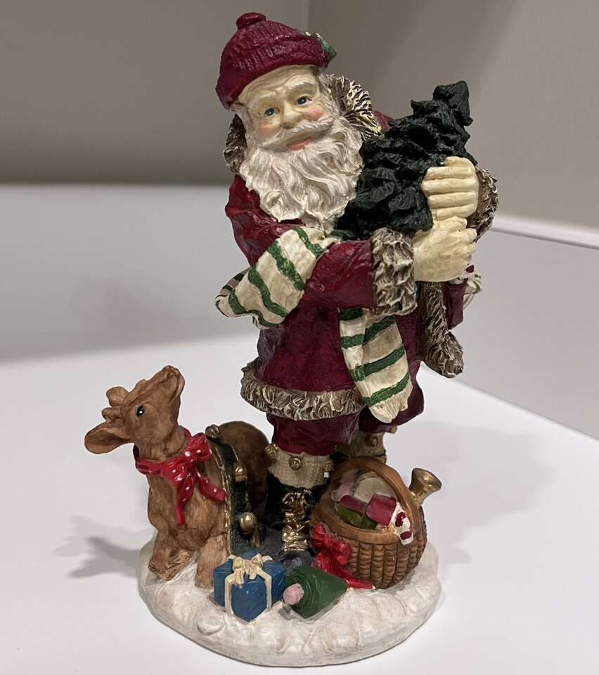Santa With Deer figurine