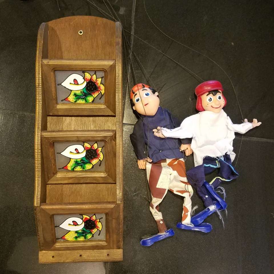 Mexican mail holder and two marionettes