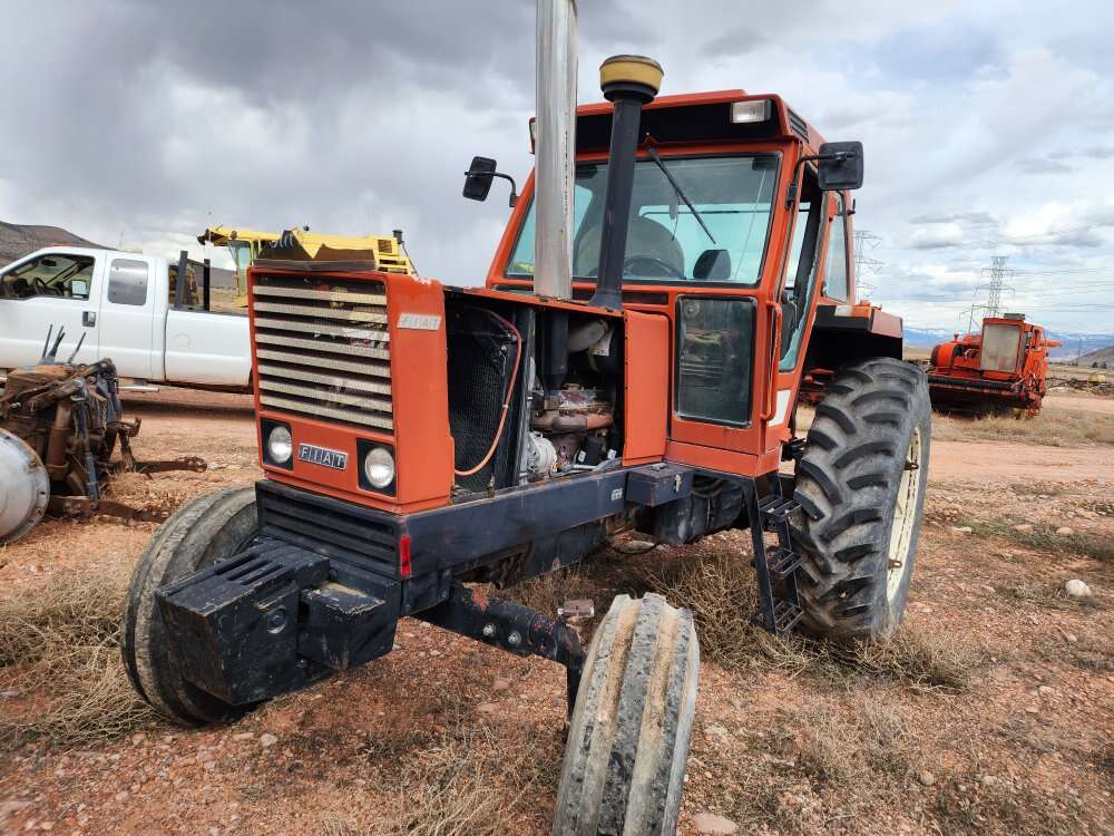 Farm tractors for parts or yard ornaments