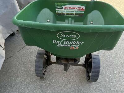 Scotts Turf Builder Edge guard DLX fertilizer or winter salt rotary spreader