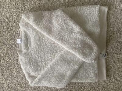 Brand new with tag. White sweater size Medium 8/10