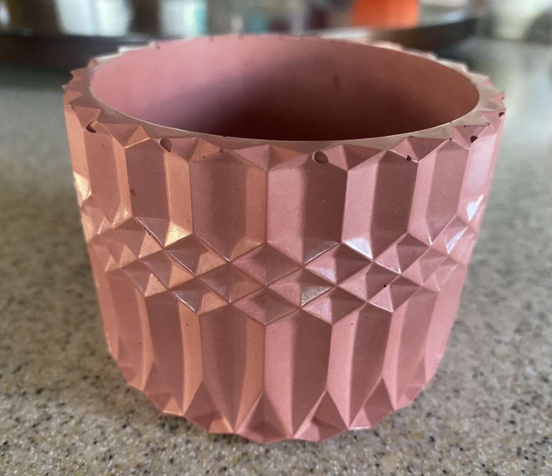 Red decorative concrete planter