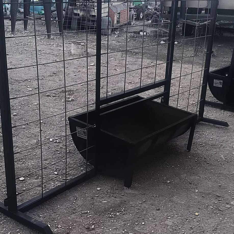 New, fence panel with built-in open top hog feeder