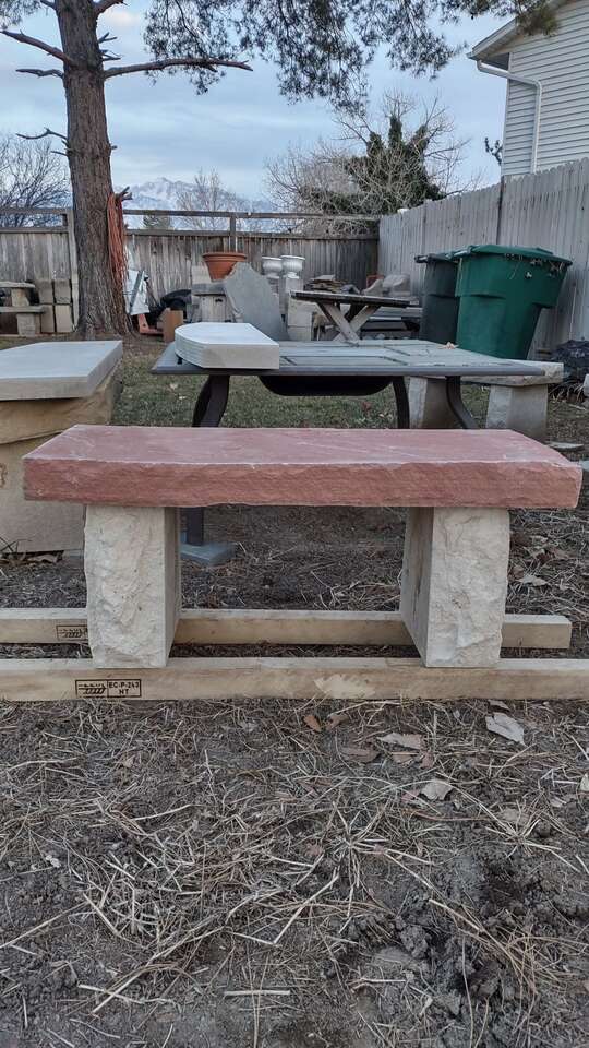 Red and white stone bench
