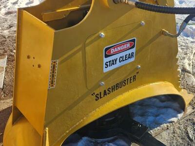 Mulching grinder head excavator