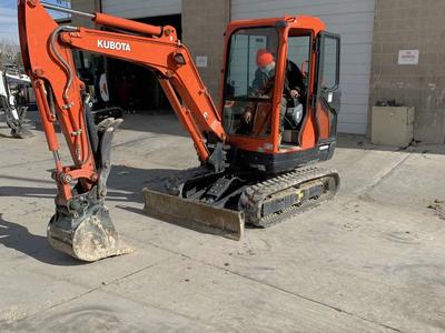 6500 Lb Mini Excavator for rent. Has cab and thumb. Only 60 inch wide, low hours